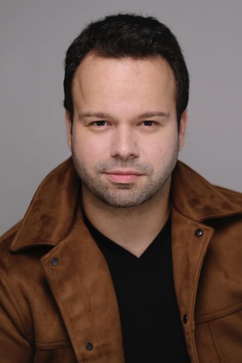 Аликан Акман