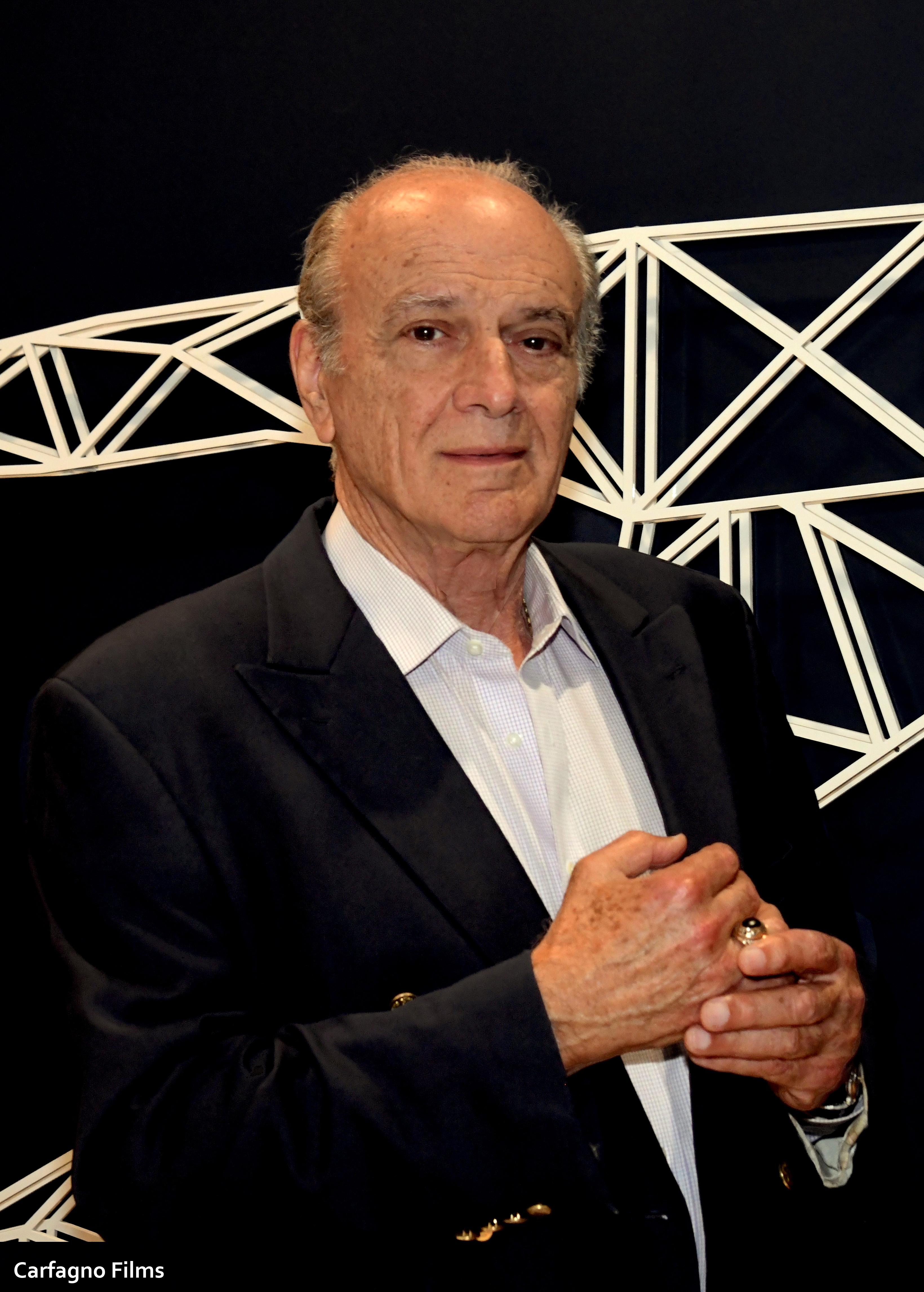 Джон Э. Кури