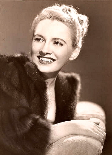 Китти Келли