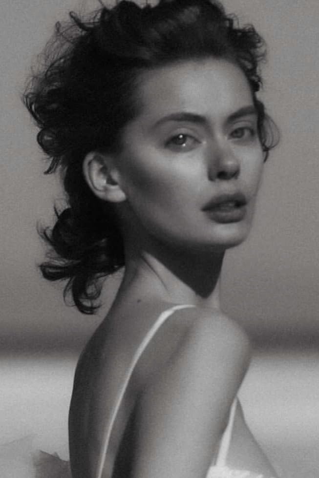 Лора Деннис