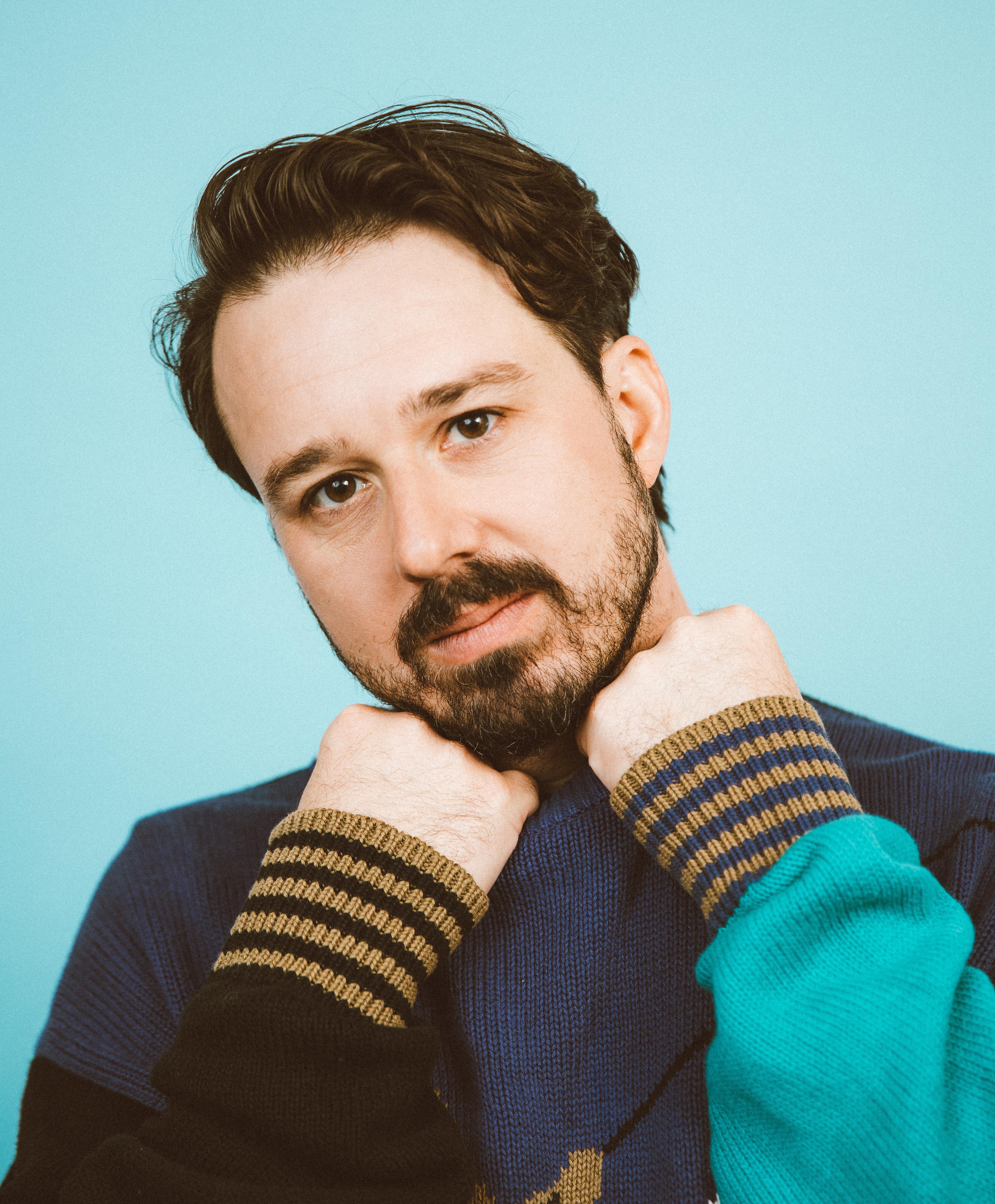 Крис Райначер