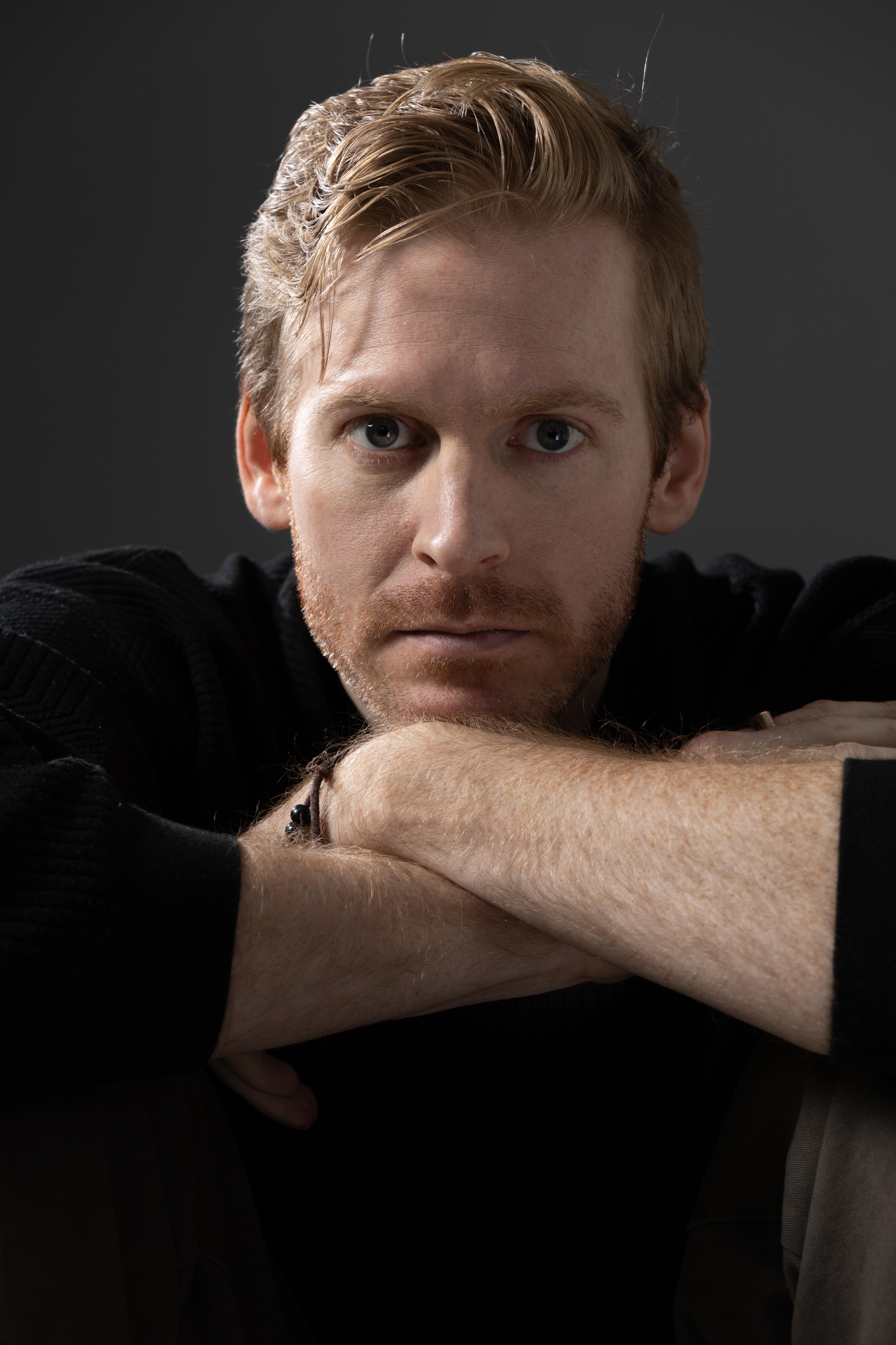 Митчелл Холланд