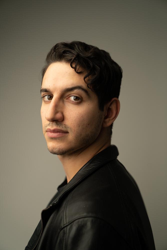 Джон Лючани