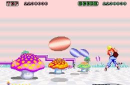 Скриншот из игры «Space Harrier»