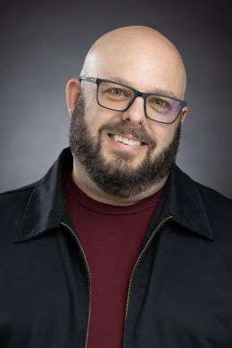 Адам Фриман