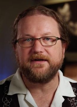 Грег Даунинг