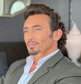 Алекс Коури