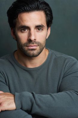 Адам Холлик